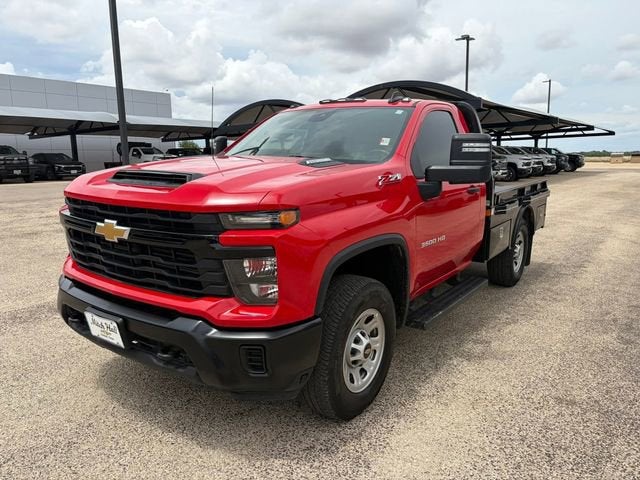 2025 Chevrolet Silverado 3500 HD WT in Red Hot — front three-quarter view